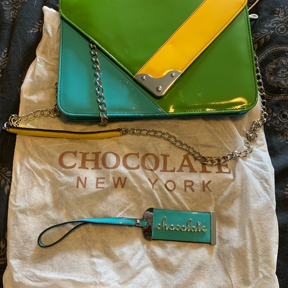 Chocolate New York clutch handbag. - Picture 2 of 4